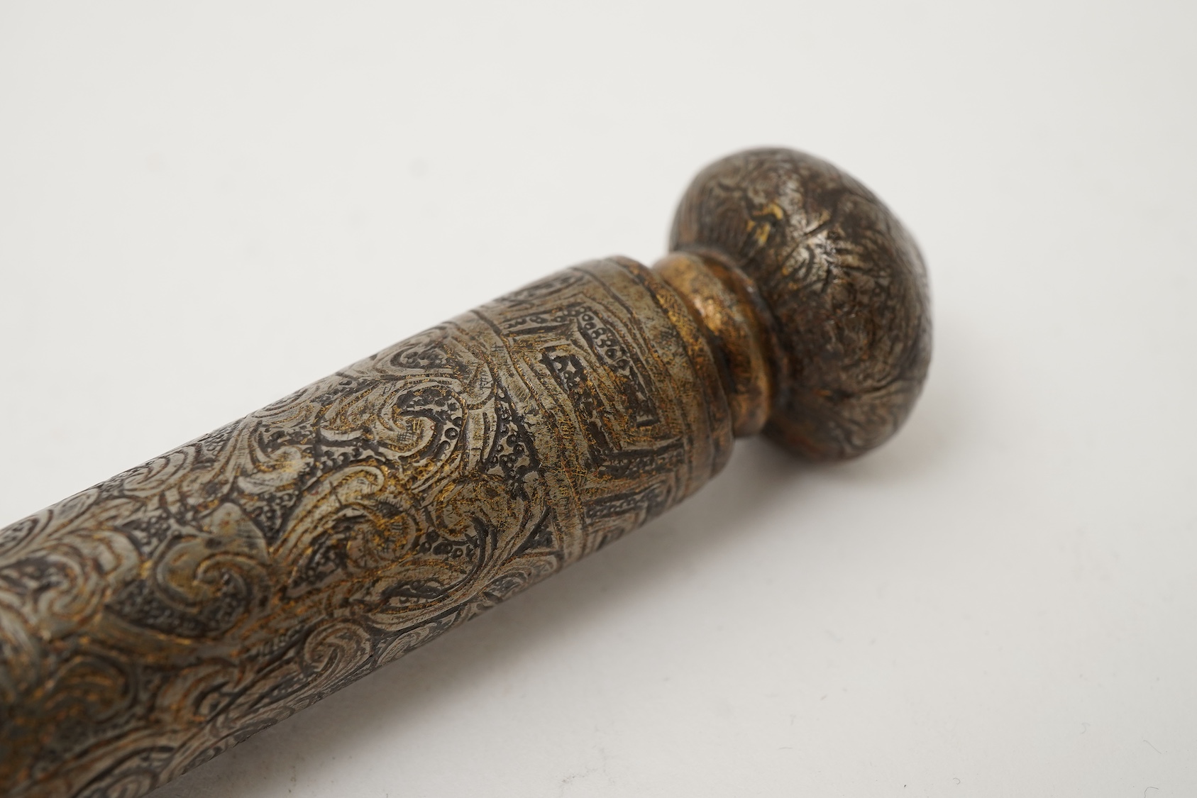 A Tibetan damascened iron scroll holder, 17th century